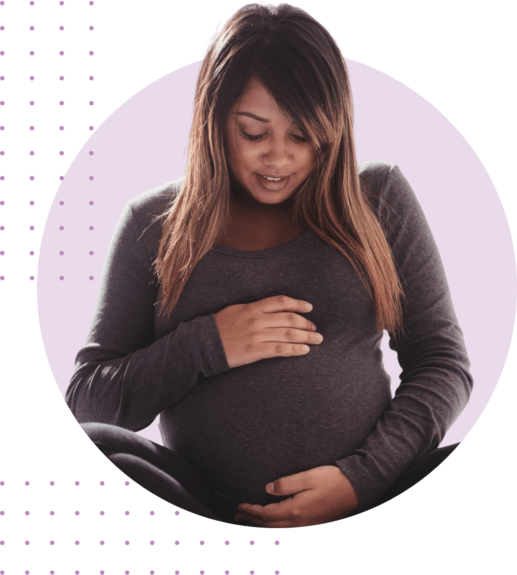 young black women holding her belly with two hands