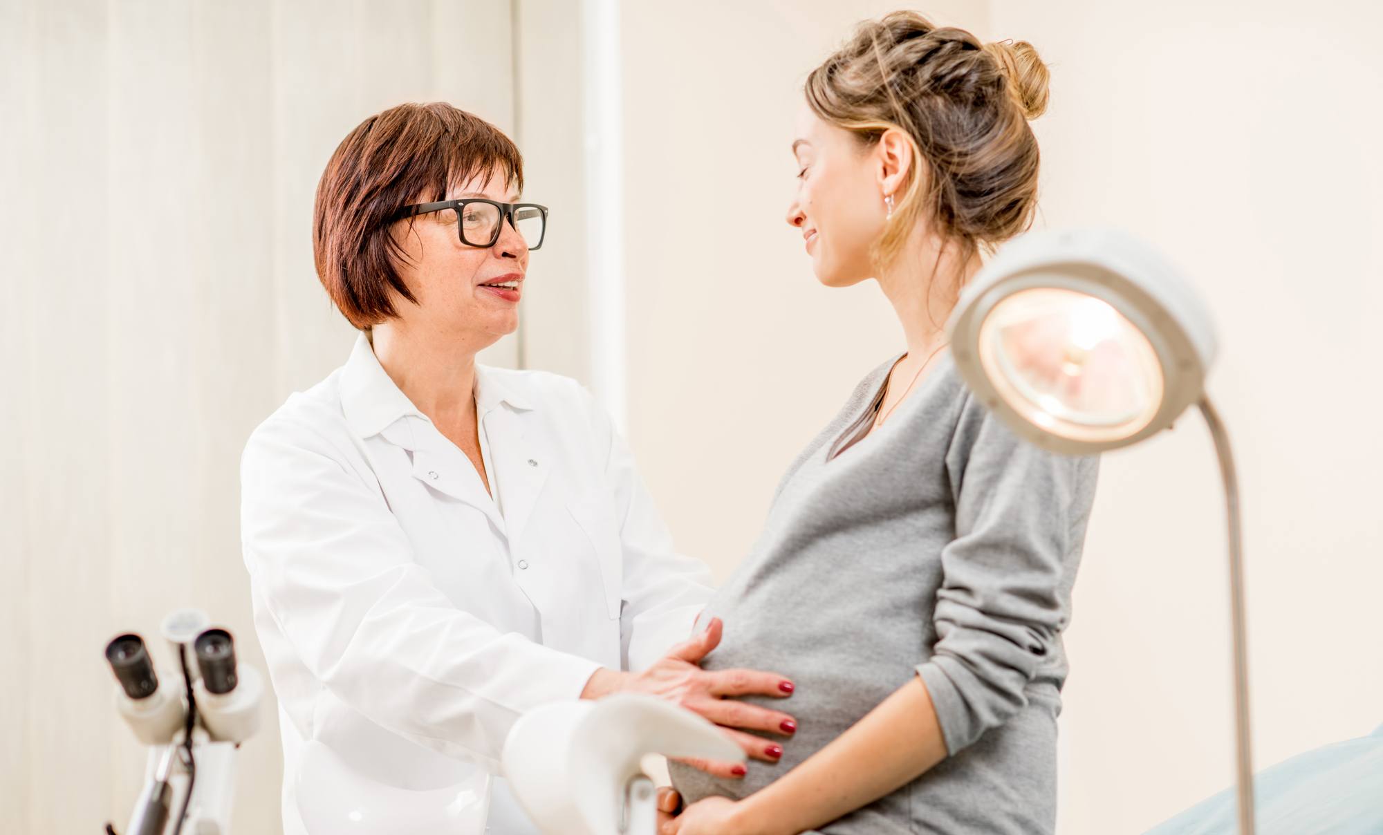 Young woman patient with gynecologist in the office