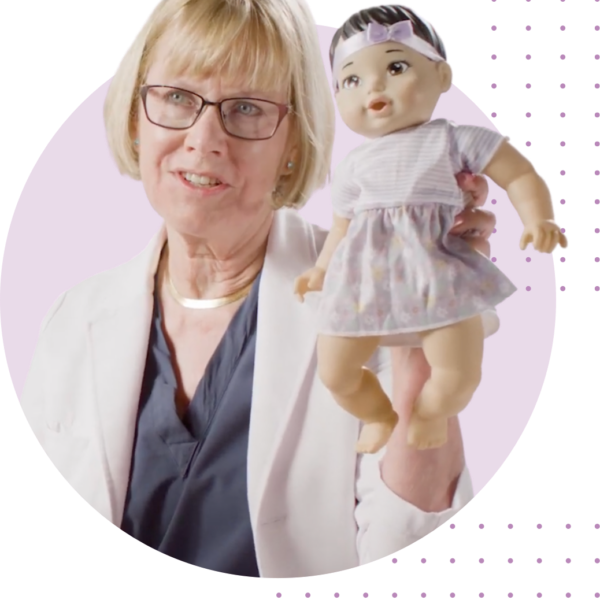 Doctor holding a doll