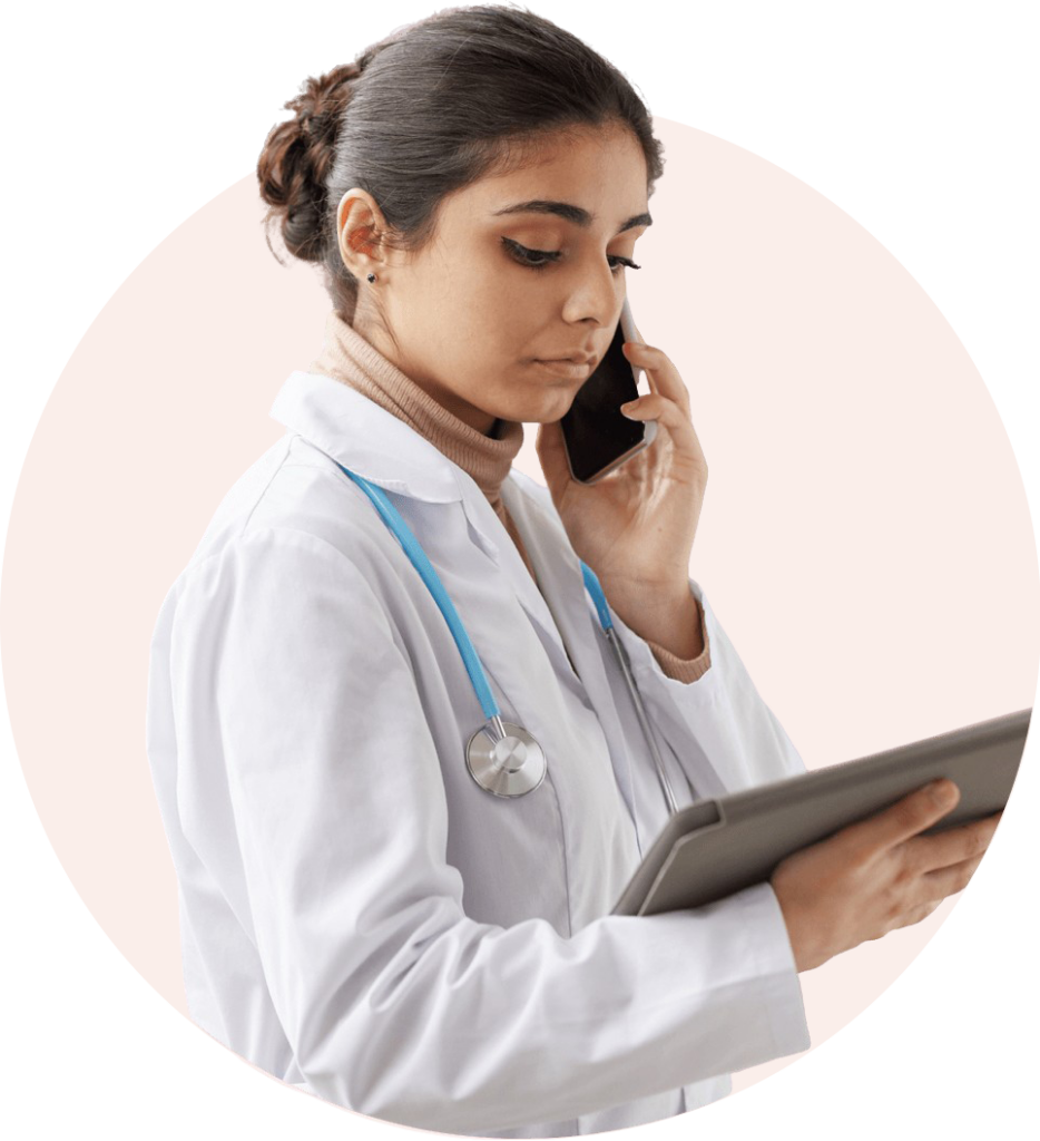 doctor on the phone holding a tablet