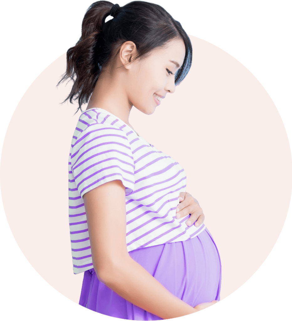 young pregnant asian women holding belly with both hand